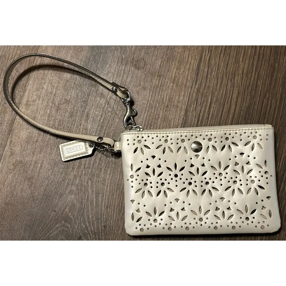 COACH Perforated Floral Vinilo Canvas Small Wristlet Bag White